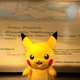 Illustration for article titled UK Artist Makes Enormous Pikachu Mosaic Out of 12,987 Pokémon Cards